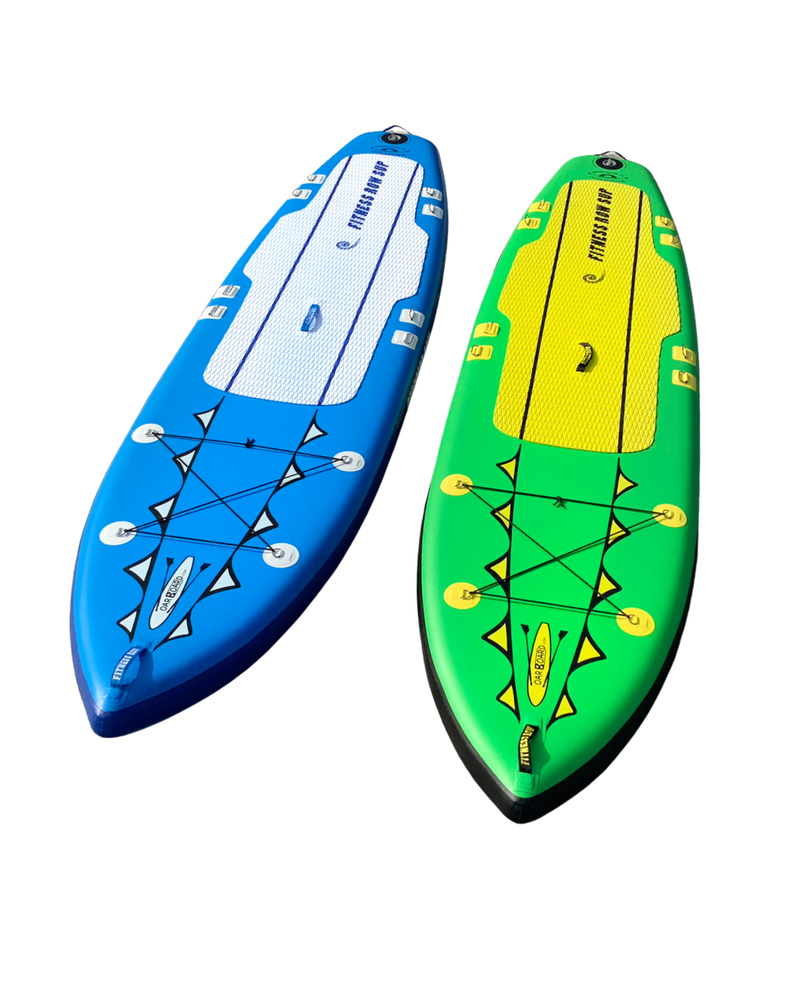 Two inflatable stand-up paddleboards shown on a plain white background, one blue with a white deck pad and one green with a yellow deck pad.