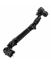 A close-up shot of a black attachment mounted on a stand, with a blurred outdoor rocky background and a blue and white surfboard visible at the bottom.